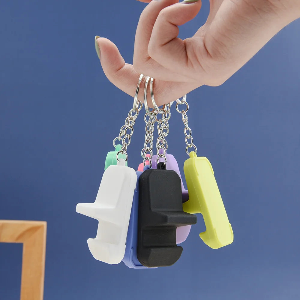 Mini Silicone Phone Stand Key Ring – Portable Bracket Holder for Smartphones